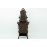 French Art Nouveau display cabinet in walnut with four doors, open compartments and whatnots,