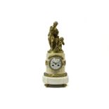19th Cent. neoclassical clock in white marble and gilded bronze with a bronze group with godess