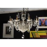 twenties' chandelier with a quite design in bronze, glass and crystal || Mooie luster met apart