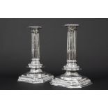pair of British17th Cent. candlesticks with typical classical design in marked and signed silver