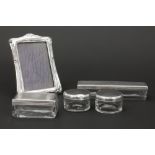 Art Nouveau style photo frame in marked silver and four powder boxes in glass with lid in marked