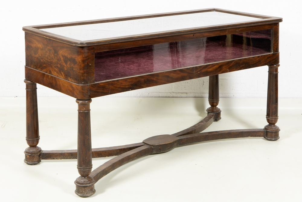 table-display cabinet made of an antique Empire style piano in mahogany with mountings in