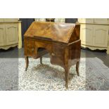 antique, possibly 18th Cent., bureau in burr of walnut with Louis XV style mountings in bronze ||
