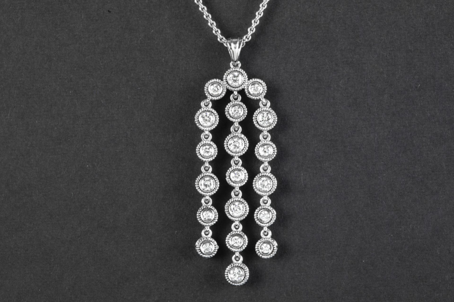 pendant in white gold (18 carat) with at least 1,35 carat of high quality brilliant cut diamonds