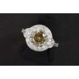 a high quality fancy cognac color brilliant cut diamond of 1,02 carat set in a ring in white gold (