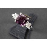 ring in white gold (18 carat) with a 2,90 carat spinel with natural purple color and with 0,48 carat
