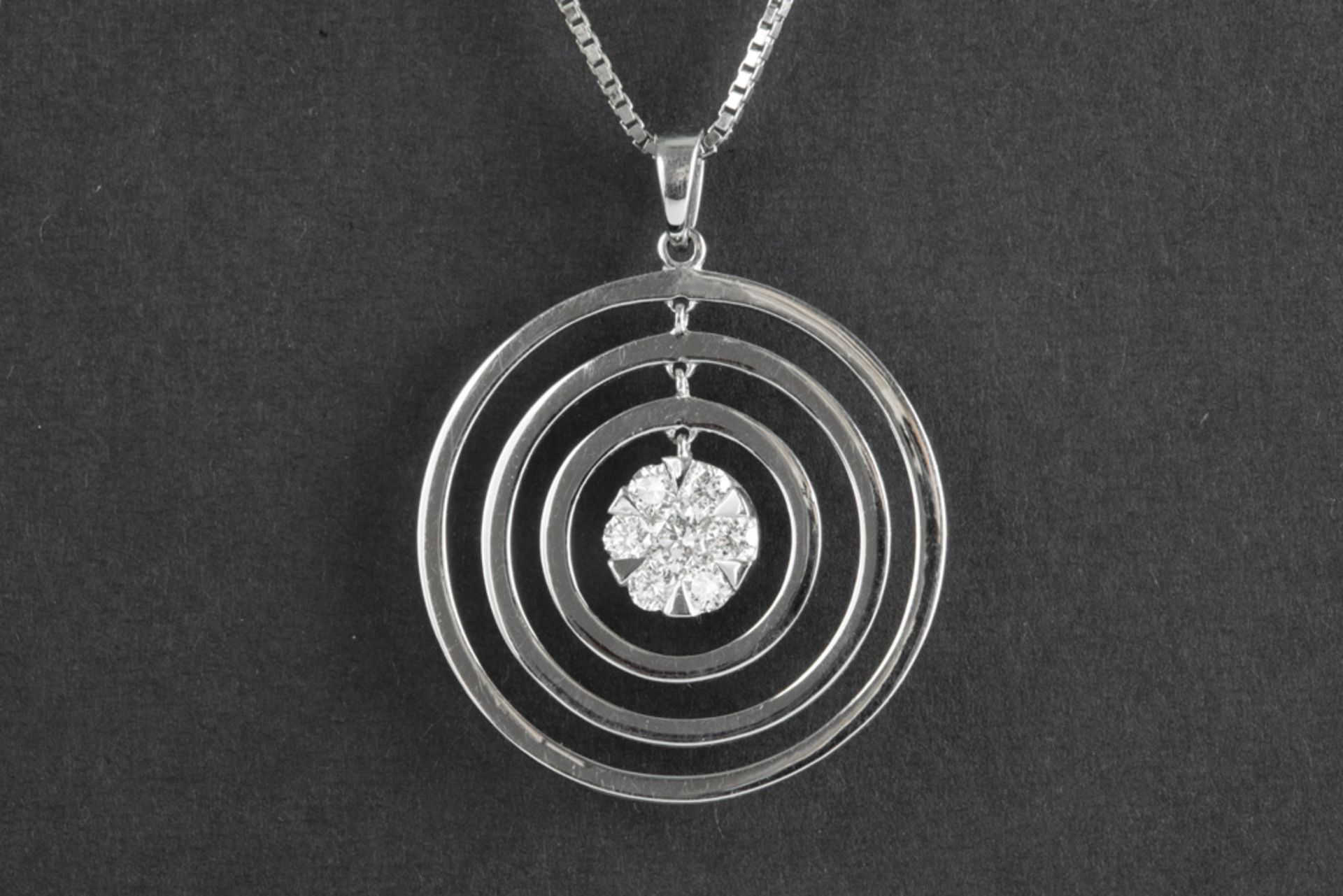 pendant in white gold (18 carat) with ca 0,60 carat of high quality brilliant cut diamonds -with a