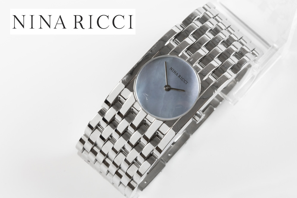 completely original Nina Ricci marked quartz ladies' wristwatch in steel with a face in blue