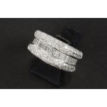 classy ring in white gold (18 carat) with ca 1,45 carat of high quality baguette and brilliant cut