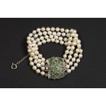 classy vintage bracelet with four rowes of white pearls, white gold (18 carat) and a beautiful