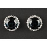 pair of round earrings in white gold (18 carat) with at least 21 carat of topaz with "London blue"