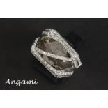 Italian AnGami signed ring with a special design in white gold (18 carat) with a ca 22 carat diamond