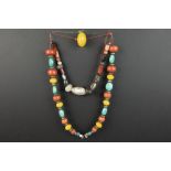 Himalayan necklace with beads in several materials || Twee colliers uit de Himalayagebieden met