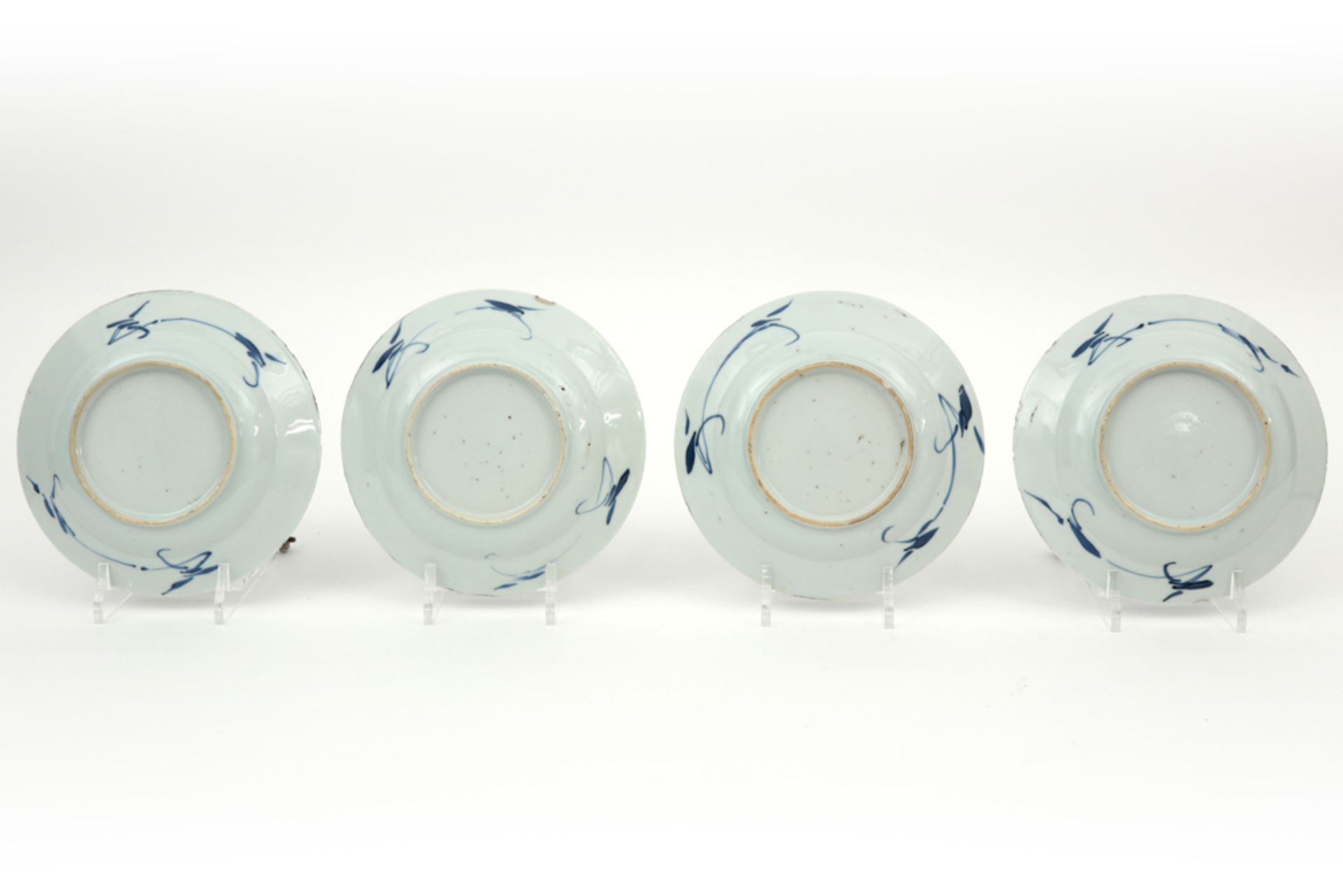 series of four small 18th Cent. Chinese plates in porcelain with a blue-white decor || Reeks van - Image 2 of 2