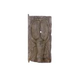 old wooden door from the Toraja in Sulawesi with the sculpted representation of a buffalo head ||