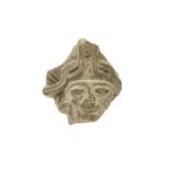 small antique Pre Columbian fragment of a stone sculpture with remains of polychromy : head with a