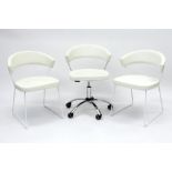 three Connubia Italy "New York" design chairs : a pair in white lacquered metal and white