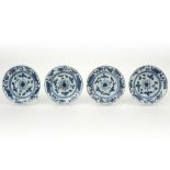 series of four small 18th Cent. Chinese plates in porcelain with a blue-white decor || Reeks van
