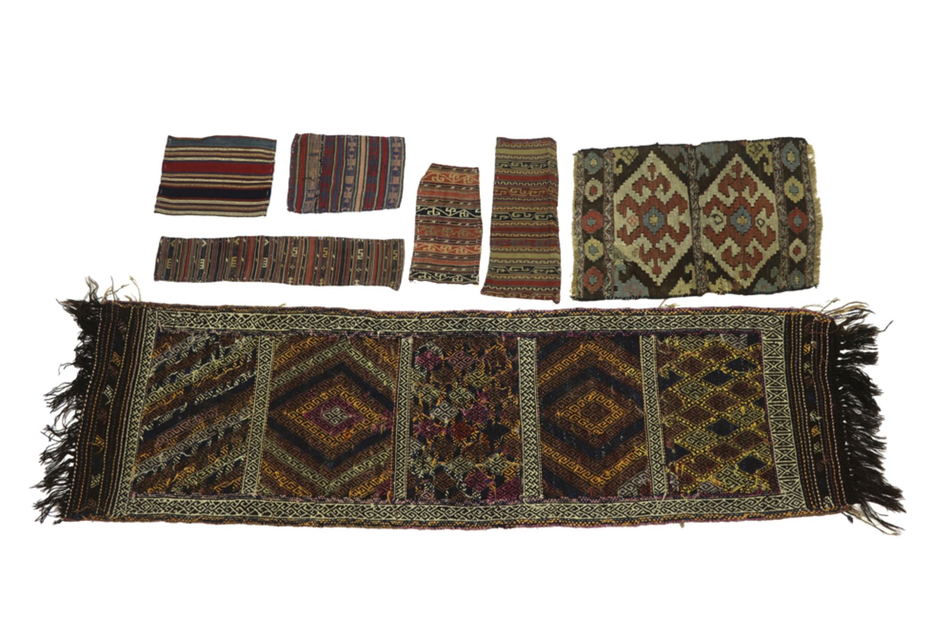 several small pieces of Near East textiel || Lot (7) textiel uit het Nabije Oosten met kleine kelims