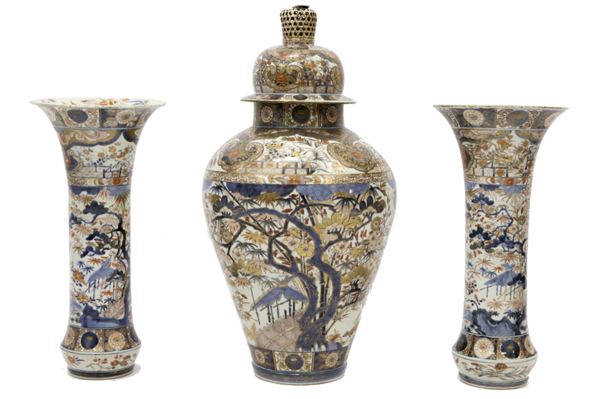 antique imposing 3pc garniture in porcelain with a fine Imari decor : a pair of vases and a vase