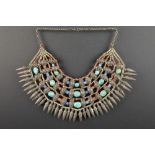 ethnic necklace with bigger beads of turquoise and lapis lazuli, smaller ones in coral and with