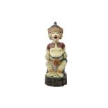 presumably early 20th Cent. Balinese wood sculpture with well preserved polychromy and depicting a