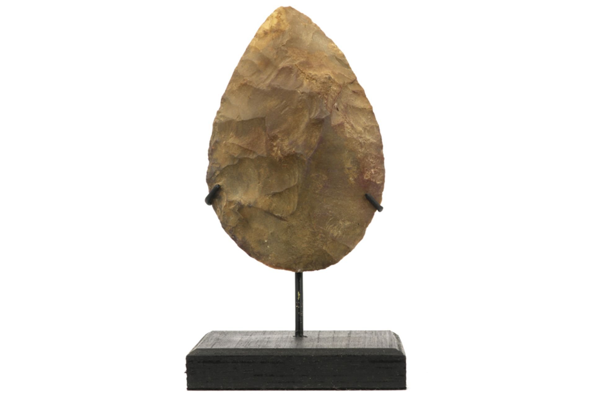 Prehistoric - about 40,000 years old - two-sided ax head found in Moustière in Dordogne (