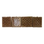 four antique Indian terracotta architectural elements (tiles from a balcony of a haveli), some