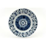 18th Cent. Kang Hsi period dish in marked porcelain with a blue-white decor with a fish scales motif