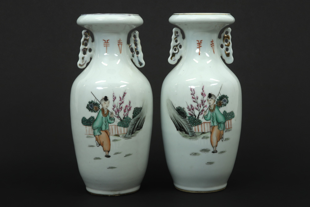 pair of Chinese Republic period vases in porcelain with a polychrome decor with men, lady and - Image 2 of 4
