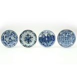four 18th Cent. Chinese plates in porcelain with a blue-white decor || Lot van vier achttiende