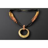 antique Pre Columbian Tairona Culture "nariguera" pendant in gold forms a reconstituted necklace