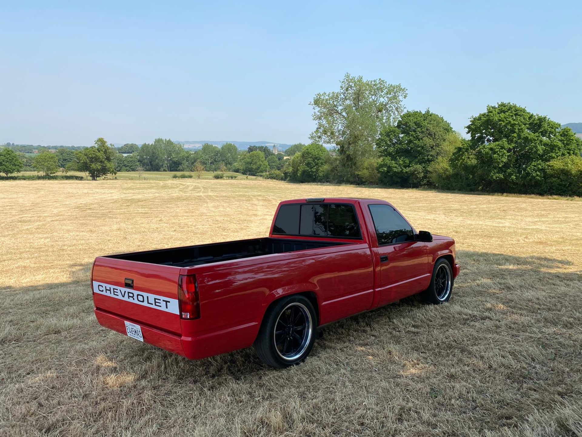 Super Red 1988 Chevrolet C1500 / OBS / GMT-400 - Single cab long bed (8ft) - Image 12 of 15