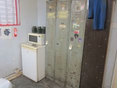 Four metal single door personnel lockers, wood effect table, 6 x various chairs, undercounter
