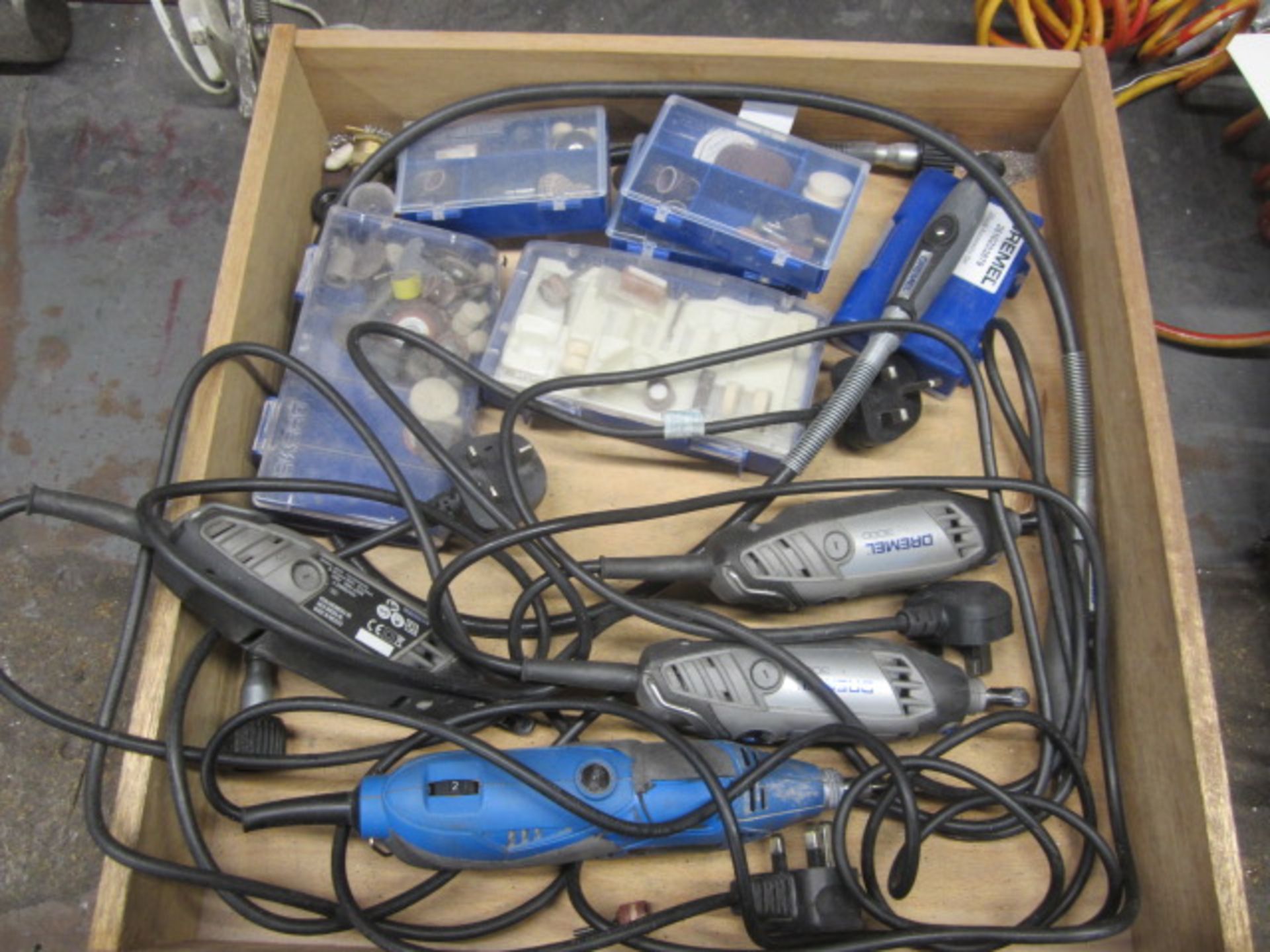 Three Dremel & 1 x Draper multi tools, assorted attachments. Located at Supreme Engineering,