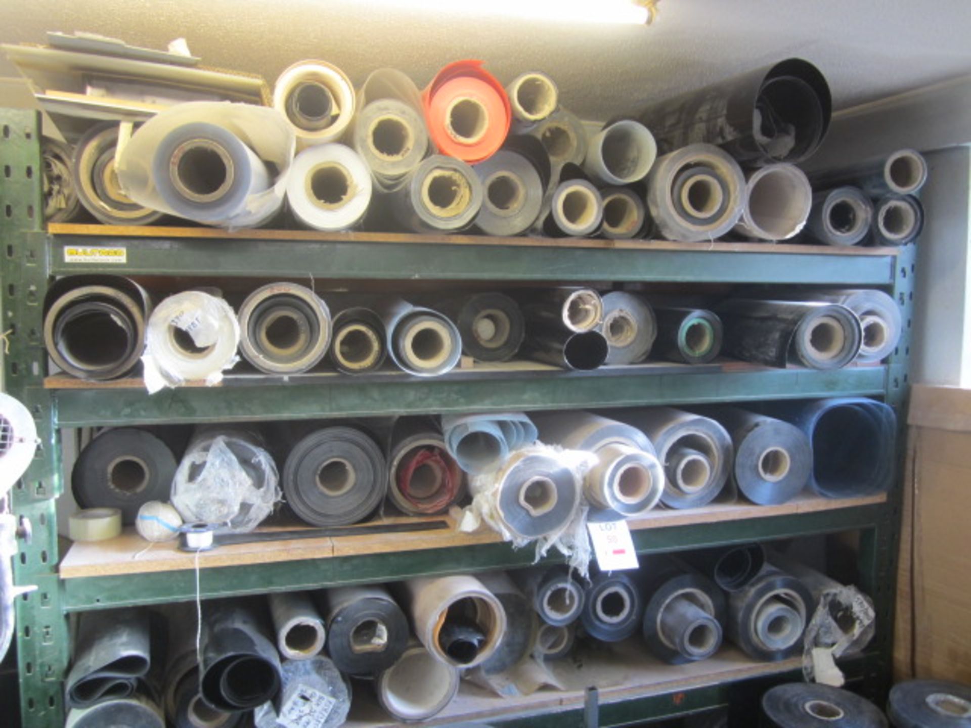 Assorted part reels of Apet film stock, approx. 85 - excluding racking. Located at Supreme