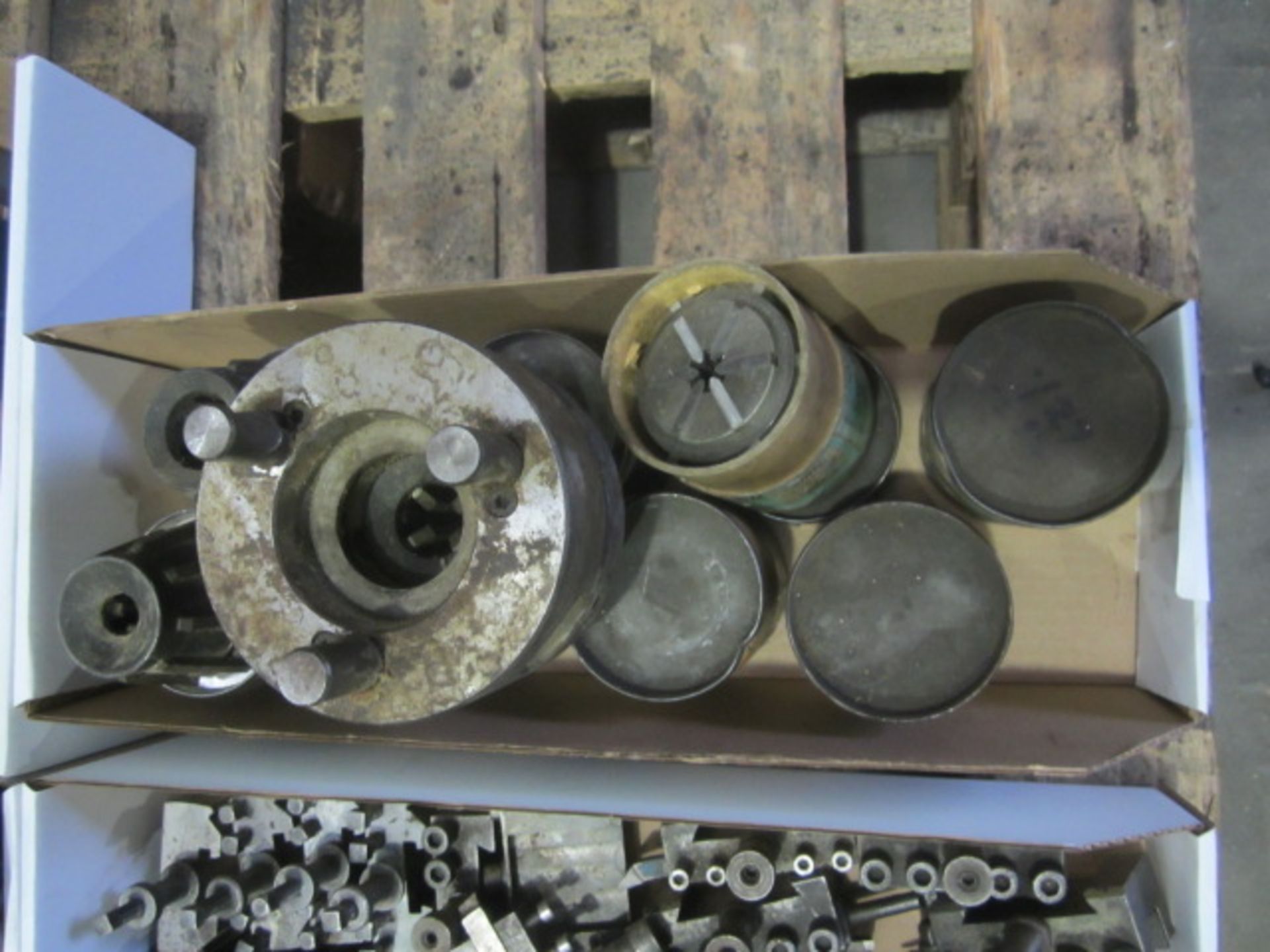 Quantity of assorted collets with collet chuck. Located at Southern Engineering Equipment, Poole