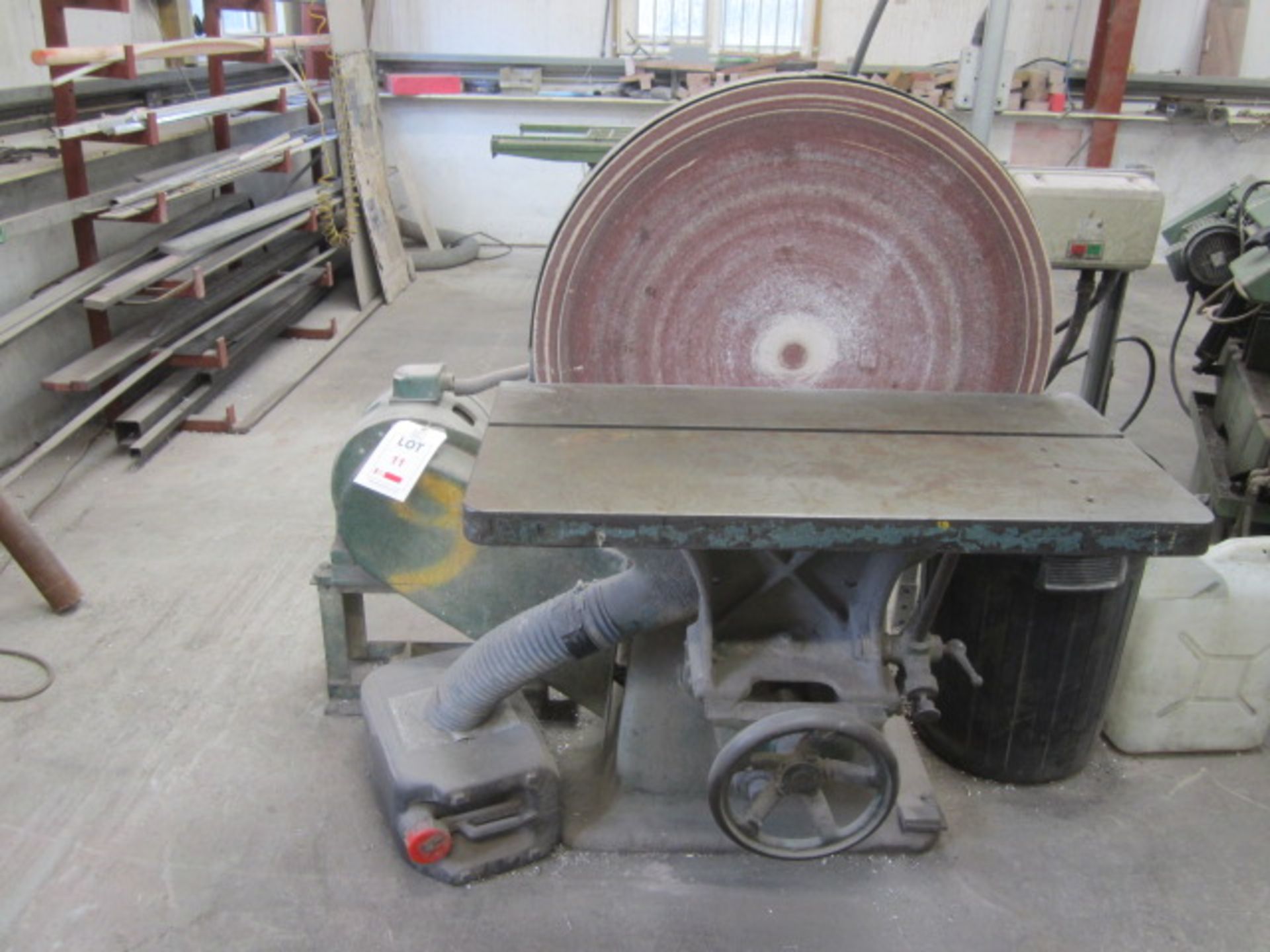 Wadkin 30" horizontal spindle disc sander, table size approx. 34" x 17". Located at Supreme