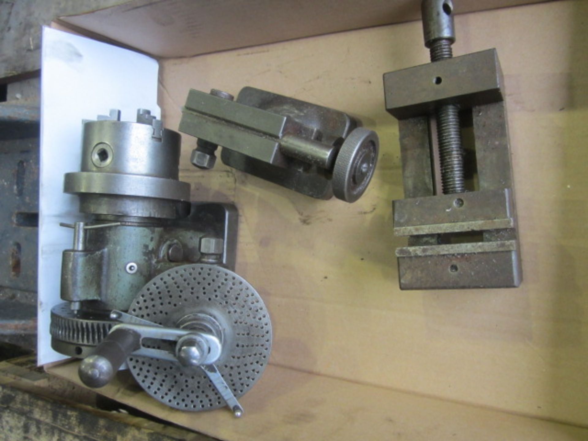 Unbadged dividing head, tail stock, machine vice, 3". Located at Southern Engineering Equipment,