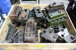 Stillage and contents including various Morris engine parts including three 1098 bottom ends, two
