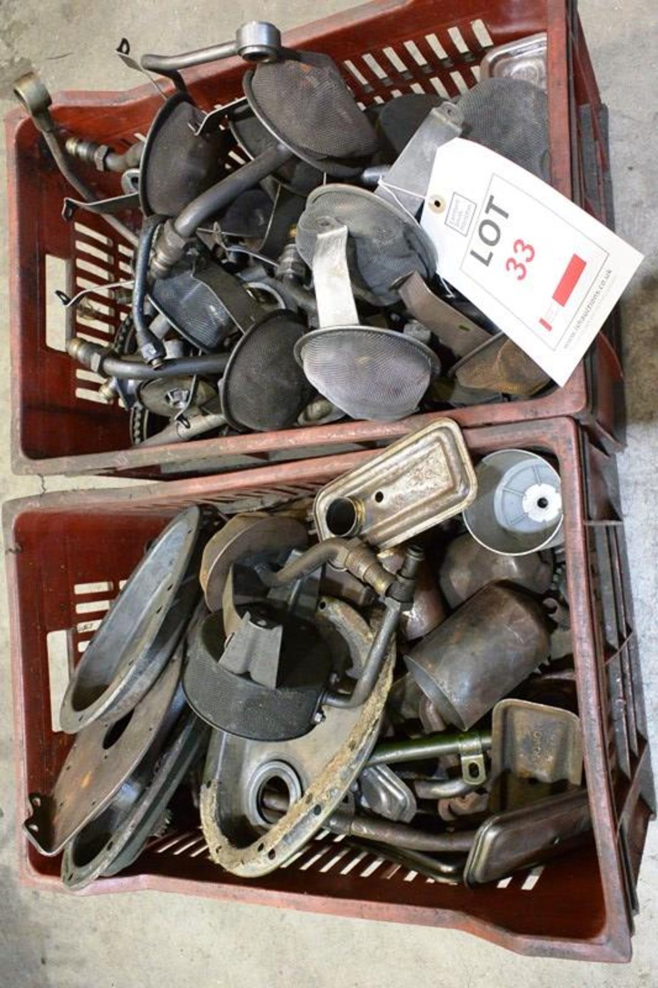 Two crates and contents to incl. Morris A Series side plates, front covers, filter housing, oil pick