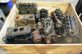Stillage and contents including various Morris engine parts including two 1098 A Series engines,