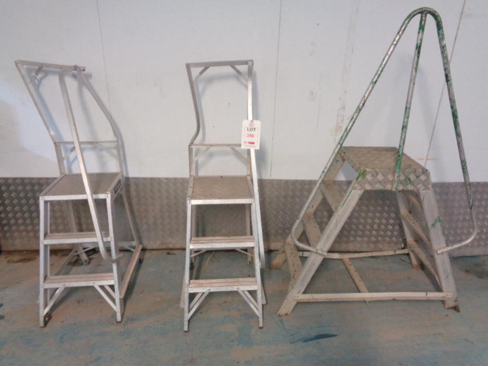 Three assorted aluminium framed step ladders