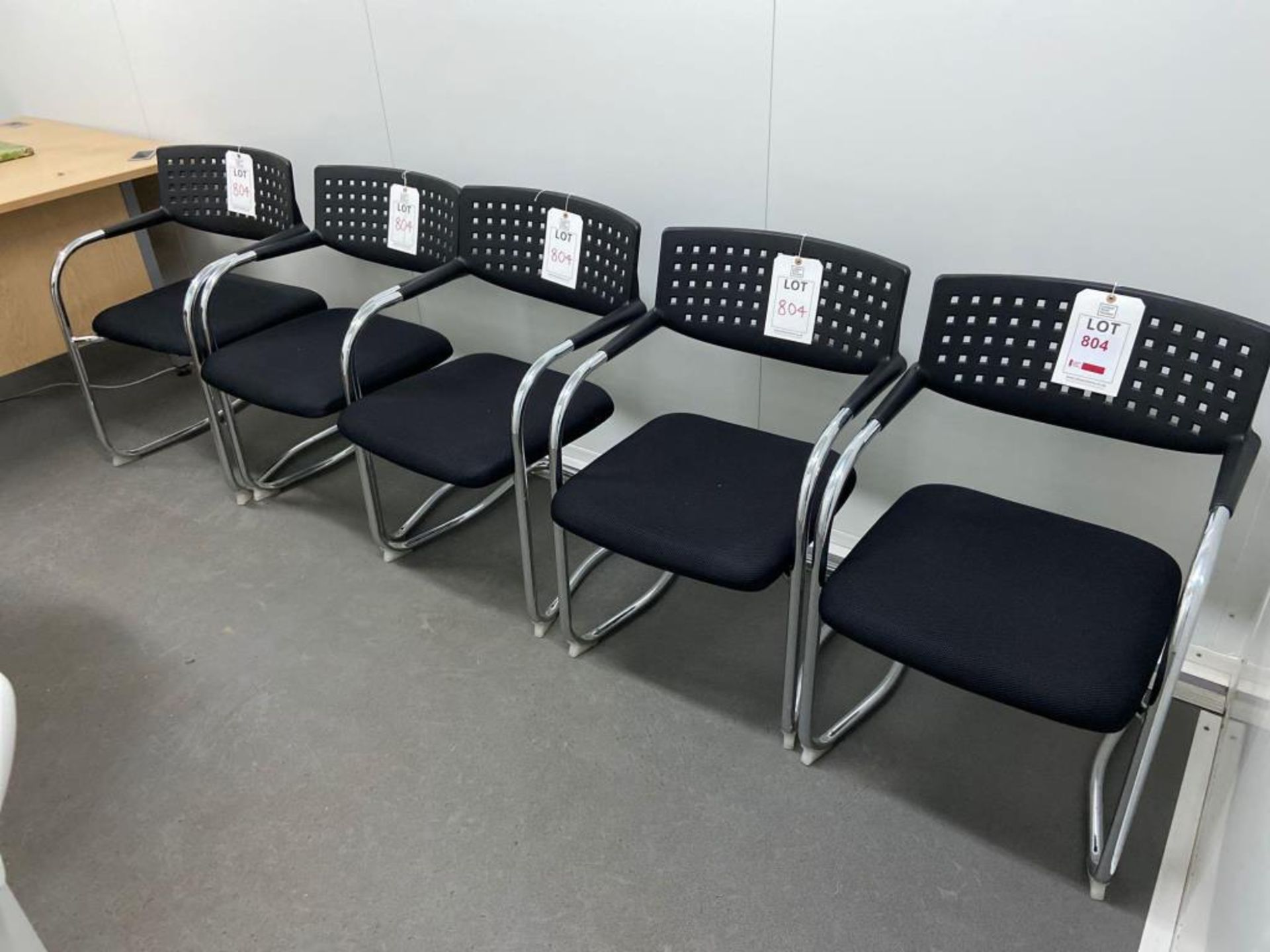 Five fabric upholstered meeting room chairs