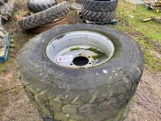 Three unbranded wheel and tires