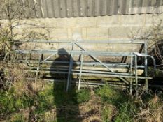 Two galvanised steel framed hand rails and galvanised steel frame yard