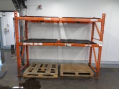 Single bay of orange boltless adjustable pallet racking