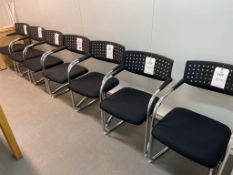 Seven upholstered meeting room chairs