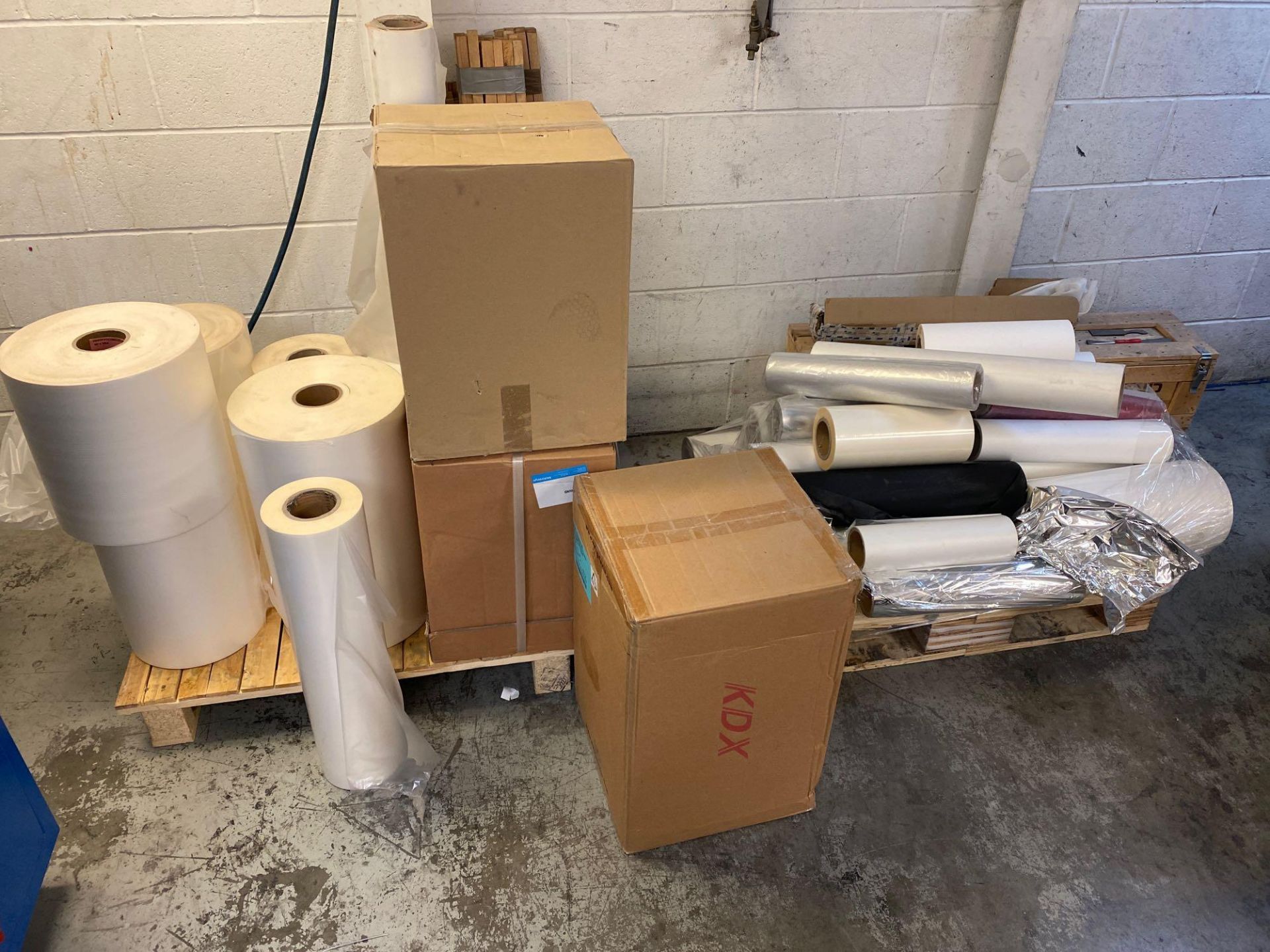 Two pallets comprising used and unused Rolls of lamination film