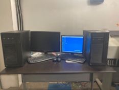 Two unnamed servers complete with keyboard and mouse 1, product code SC5275E Serial number